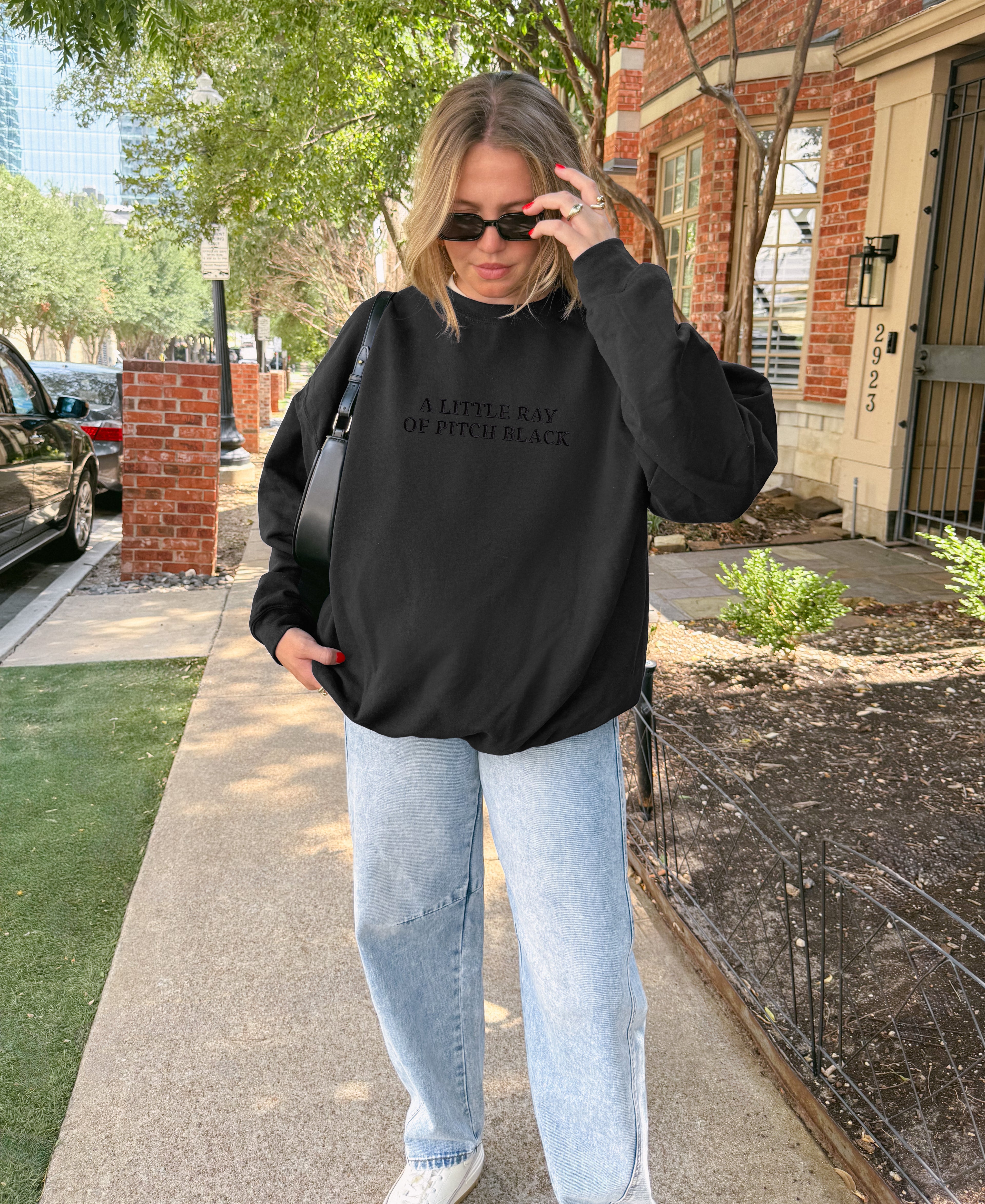 A Little Ray of Pitch Black Sweatshirt